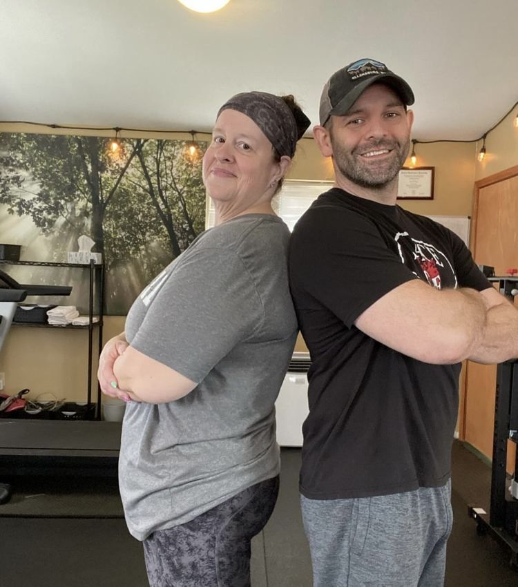 Andy and a client in the Home Performance Fitness studio